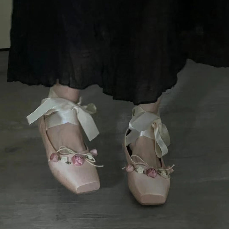 Woman Wearing Ballet Slippers With Cross Lacing